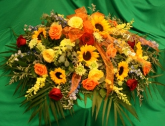 Sympathy Casket Spray Fall-color from Mischler's Florist and Greenhouses in Williamsville, NY