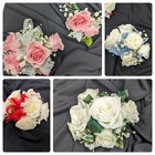 Wrist Corsage and Boutonnieres  from Mischler's Florist and Greenhouses in Williamsville, NY
