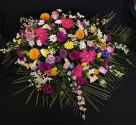 Colorful Casket Spray  from Mischler's Florist and Greenhouses in Williamsville, NY