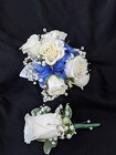 Wrist Corsage & Boutonnière blue from Mischler's Florist and Greenhouses in Williamsville, NY